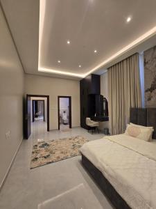 Ένα ή περισσότερα κρεβάτια σε δωμάτιο στο The horizon sanctuary villa ملاذ الافق