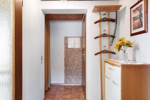 a hallway with a door leading into a bathroom at Haus Ingrid in Schluchsee +65 photos