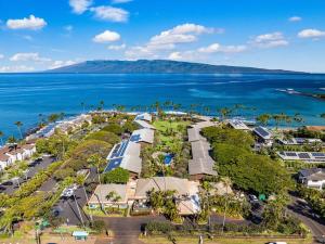 an aerial view of a resort next to the ocean at Napili Shores D227 · NS D227 OceanFront Resort w Pool in Kahana
