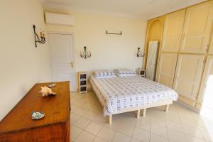 Una cama o camas en una habitación de Appartement rooftop vue mer