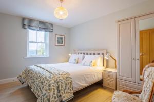 En eller flere senge i et værelse på Whitehill House Farm