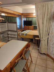 Postel nebo postele na pokoji v ubytování Marilleva