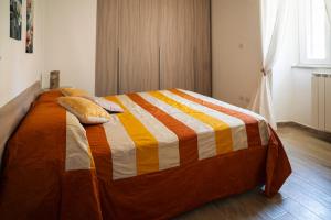 Postel nebo postele na pokoji v ubytování San Martino Guest House Sunlight