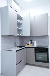 Η κουζίνα ή μικρή κουζίνα στο Wohnung IC - Luxus-Apartment mit Elegantem Design