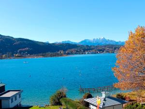 a view of a large body of water at Seeappartements Villa Sole in Pörtschach am Wörthersee