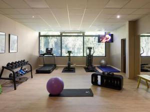 Fitness centrum a/nebo fitness zařízení v ubytování Novotel Bayeux