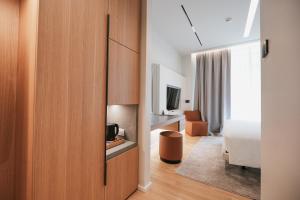 Magnus Hotel電視和／或娛樂中心