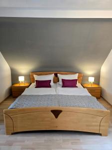 Postel nebo postele na pokoji v ubytování Ferienhäuschen in Dickesbach