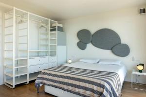 Ένα ή περισσότερα κρεβάτια σε δωμάτιο στο La Terrasse de la Mer 6 Pool-Parking-BBQ-Wifi +91 φωτογραφίες