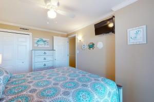 Ένα ή περισσότερα κρεβάτια σε δωμάτιο στο Polynesian 309