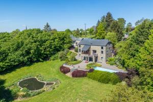 an aerial view of a large house with a yard at Sous le Cielle d'Ardenne in La Roche-en-Ardenne