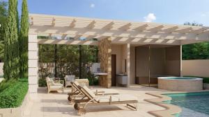 a pergola with chairs and a swimming pool at Solena in Camburi