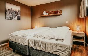 Postel nebo postele na pokoji v ubytování Woude