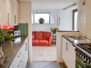 Köök või kööginurk majutusasutuses Mad Nelly Cottage +14 fotot