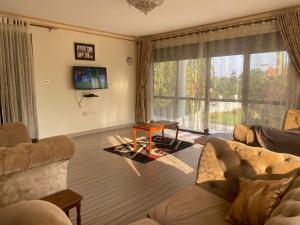 TV a/nebo společenská místnost v ubytování 7Jon Babiha