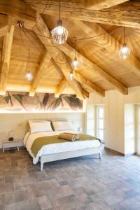 Ένα ή περισσότερα κρεβάτια σε δωμάτιο στο Bed and Breakfast Cascina Morelli 1862