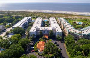an aerial view of the resort with the beach in the background at Beach Club, Unit 134 in East End