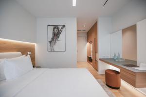 Magnus Hotel房間的床 +78 張相片