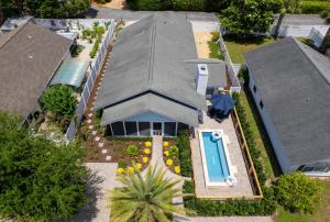 an overhead view of a house with a swimming pool at Point Five - 1133 Mallery St in Saint Simons Island