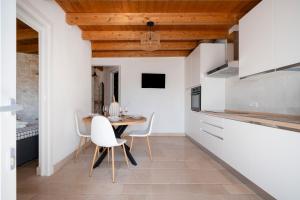 Kuchyň nebo kuchyňský kout v ubytování Il Trullo di Grace Castellana + 20 fotografií