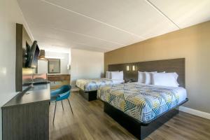 Postel nebo postele na pokoji v ubytování Motel 6 Stockbridge GA Hwy 138 W + 34 fotografií