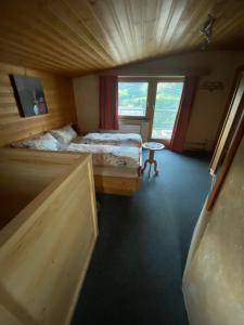 Ένα ή περισσότερα κρεβάτια σε δωμάτιο στο Ferienwohnung Bergheimat