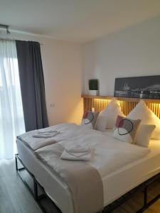 Postel nebo postele na pokoji v ubytování SSC Sport+Seminarcenter Radevormwald