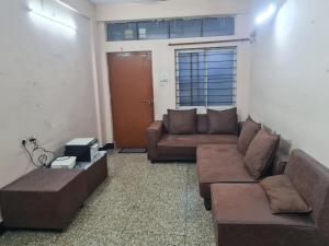 Posezení v ubytování The Family Nest