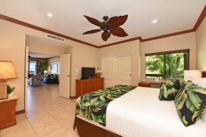 a bedroom with a bed and a ceiling fan at Kapalua Golf Villas 19T6 · KGV 19T6 Updated 2BD Kapalua Panorami in Kahana