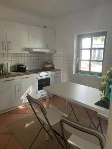 Kuchyň nebo kuchyňský kout v ubytování Fachwerkhaus im historischen Innenhof von Haus Im Turm + 13 fotografií