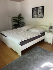 Postel nebo postele na pokoji v ubytování Fachwerkhaus im historischen Innenhof von Haus Im Turm