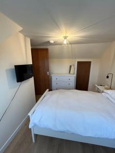 Ένα ή περισσότερα κρεβάτια σε δωμάτιο στο Tigh-Na-Croit