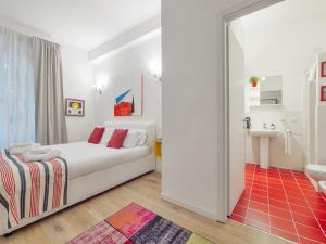 Postel nebo postele na pokoji v ubytování LikeHome Milano - Via Crema