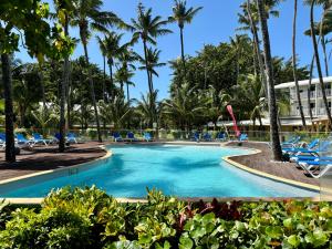 a pool at the resort at Studio Carayou Pointe du Bout Les Trois-Ilets in Les Trois-Îlets