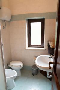 Koupelna v ubytování CASA VACANZA LE TERRAZZE Holiday home and spa + 14 fotografií