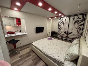 Μια τηλεόραση ή/και κέντρο ψυχαγωγίας στο Квартира проспект Науки Центр