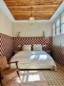 Postel nebo postele na pokoji v ubytování Riad El Badun