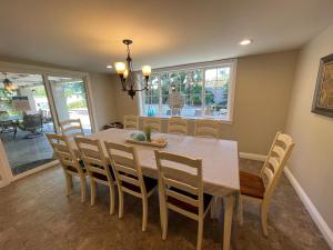 a dining room with a table and chairs at Destination #10 in Anaheim