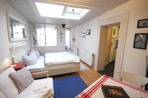 Ένα ή περισσότερα κρεβάτια σε δωμάτιο στο Warnemünde Ferienbungalow Diana 38559