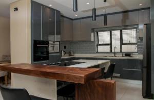 Kuchyň nebo kuchyňský kout v ubytování Simphiwe Guesthouse