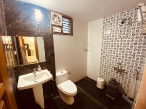 Ένα μπάνιο στο AL MANAL 302 Premium Rooms