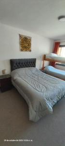 a large bed in a room with at Penitentes Complejo Ruta Nacional Nº 7 in Las Cuevas