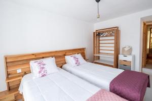 Postel nebo postele na pokoji v ubytování Casa Sol Nascente