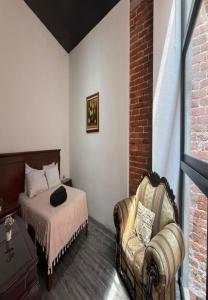 Ένα ή περισσότερα κρεβάτια σε δωμάτιο στο Apartamento Uruguay Centro Histórico