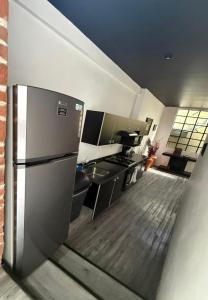 Η κουζίνα ή μικρή κουζίνα στο Apartamento Uruguay Centro Histórico