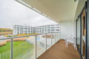 En balkon eller terrasse på APT Nadmorskie - Polanki AQUA