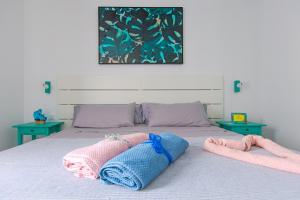 En eller flere senge i et værelse på Casa Camilla Alisios Playa + 8 billeder