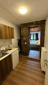 Kuchyň nebo kuchyňský kout v ubytování Nest Suite