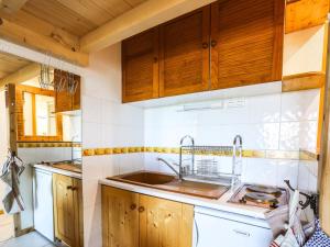 Kuchyň nebo kuchyňský kout v ubytování Studio 3 pers, balcon, proche pistes et commerces, animaux acceptés - FR-1-411-493 + 8 fotografií