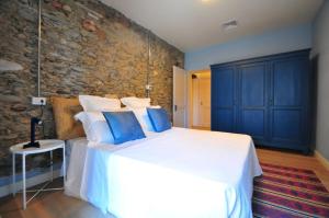 Ένα ή περισσότερα κρεβάτια σε δωμάτιο στο Villa Querceta 2Min Von Forte Dei Marmi